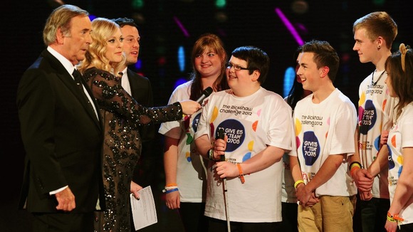 Sir Terry Wogan, Fearne Cotton and Matt Baker live on stage with The Rickshaw Challenge team.