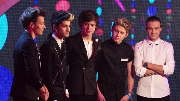 One Direction light up the stage.