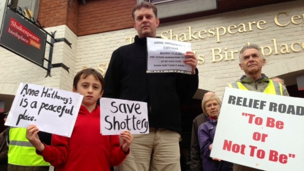 Placards displaying messages against the housing developments