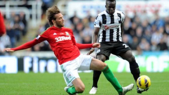 Michu and Cheik Tiote