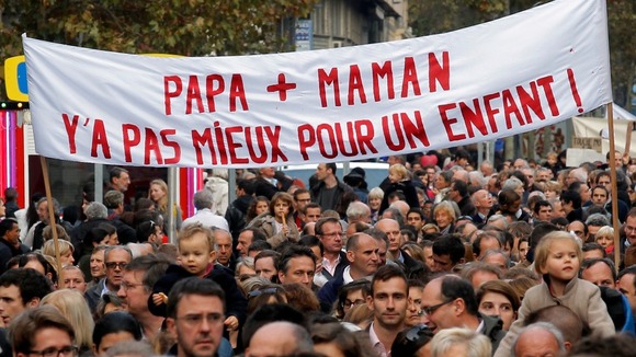 Opponents of the same-sex marriage demonstrate against the government's draft law