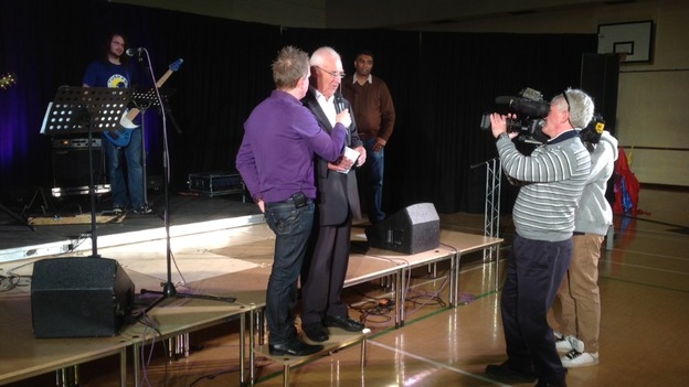 Mike Howitt on stage at the Trinity Life Church in Leicester