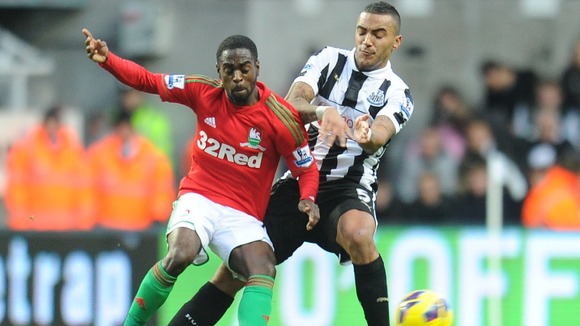 Newcastle's Danny Simpson and Swansea's Nathan Dyer