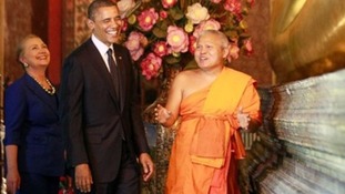 President Obama and Hillary Clinton shared a joke with a monk at the base of the Reclining Buddha