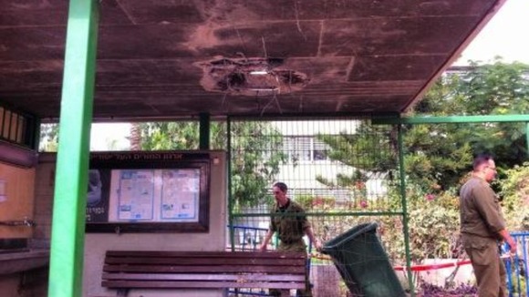 A hole punctured in the roof of a school in Ashkelon