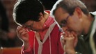 The Reverend Jane Morris prays at St Gabriels Church in Cricklewood, north London