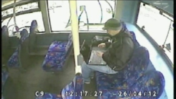 Allen inspected the stolen laptop on a bus as he travelled south