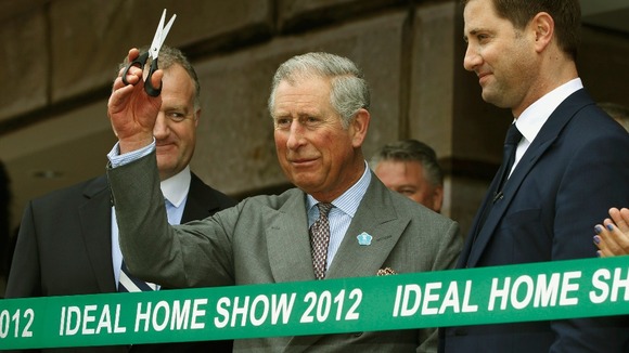 The Prince of Wales (centre) prepares to officially open the Ideal Home Show, Earls Court, London on March 16th 2012.