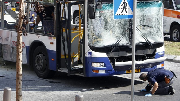 The blast shattered windows as the bus drove along a street next to Israel's Defence Ministry Headquarters