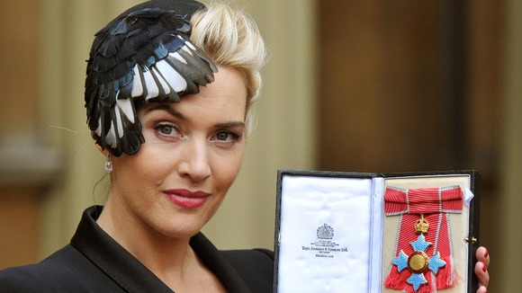 Kate Winslet outside Buckingham Palace with her CBE