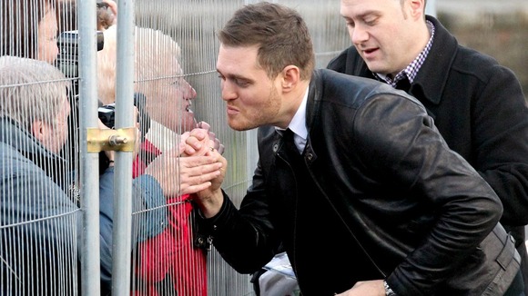 Michael Buble meets fans as he arrives for the Rod Stewart Christmas Special