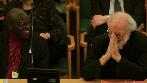 The Archbishop of York and Archbishop of Canterbury share a joke at the General Synod