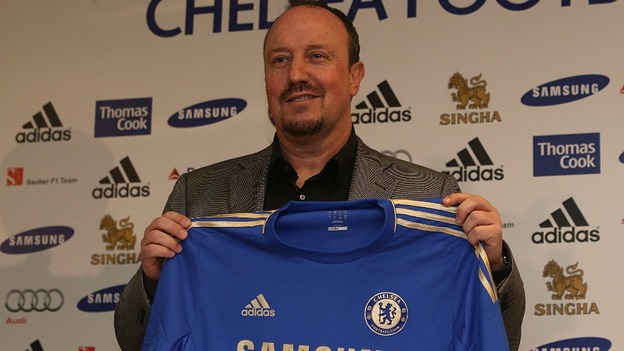 Rafa Benitez pictured with a Chelsea shirt at Stamford Bridge