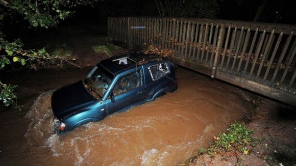 The car trapped in the flooded ford in Chew Stoke