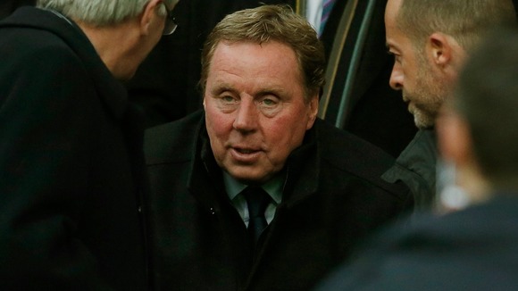 Queens Park Rangers' new manager Redknapp in the stand before QPR's match against Manchester United at Old Trafford in Manchester.