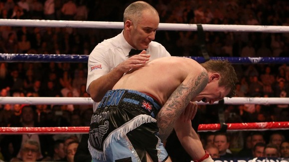 Hatton on the floor after a winning body shot from Vyacheslav Senchenko.
