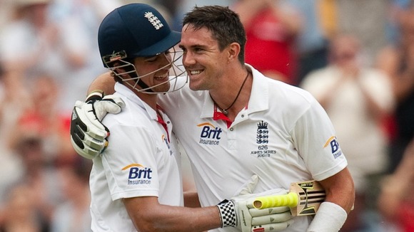 England's Kevin Pietersen celebrates reaching his century with Alastair Cook in Adelaide in 2010.