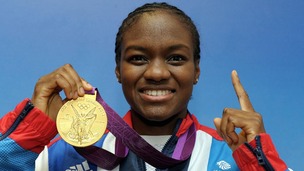 Nicola Adams with her gold medal won in the boxing 51kg category at Team GB house in London.