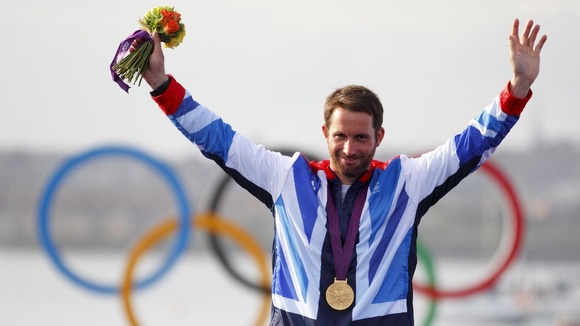 Ben Ainslie celebrating his fourth Olympic gold medal at the sailing venue in Portland.