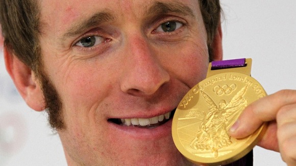 Bradley Wiggins during a photocall after winning the Men's Individual Time Trial on day five of the London Olympic Games.