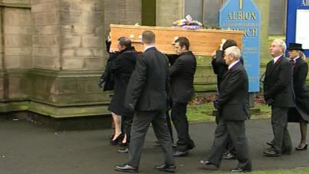Bill Tarmey's coffin is carried into the Albion United Reform Church in Manchester.