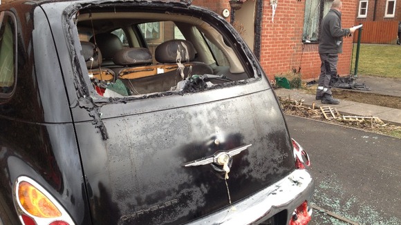 The fire has damaged cars and homes in the surrounding areas 