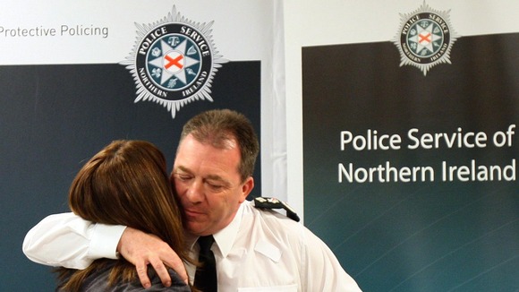 Constable Stephen Carroll's widow Kate Carroll with Chief Constable Matt Baggott.