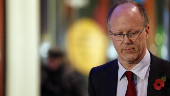 BBC director general George Entwistle stands outside BBC Broadcasting House after he announced his resignation