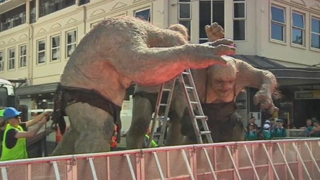 Sculptures being moved into place ahead of The Hobbit's world premiere in New Zealand