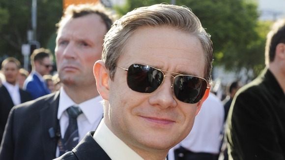British actor Freeman, who plays the character Bilbo Baggins, poses on the red carpet in Wellington.