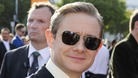 British actor Freeman, who plays the character Bilbo Baggins, poses on the red carpet in Wellington.