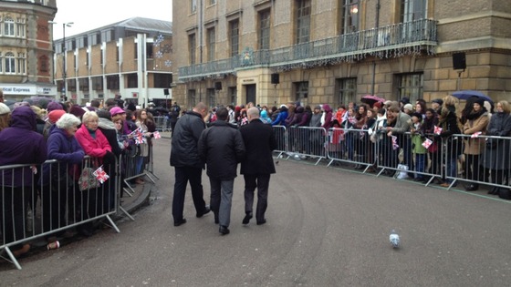 Hundreds of people line the streets of Cambridge and wait for the Royal couple.