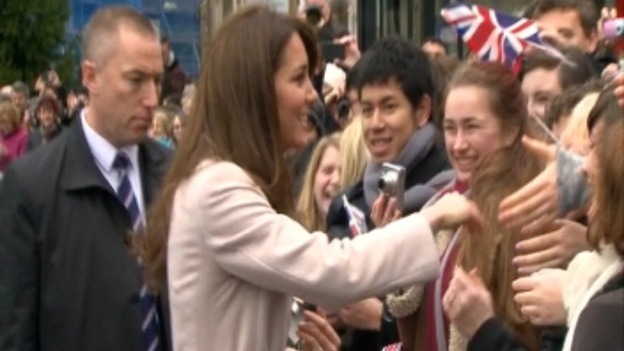 The crowd are delighted to catch a glimpse of the Duchess.