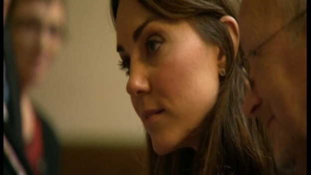 The Duchess listens to a young person.
