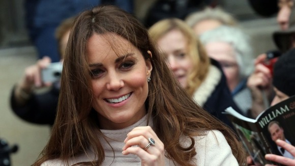 The Duchess spent time with the crowds and received dozens of gifts.