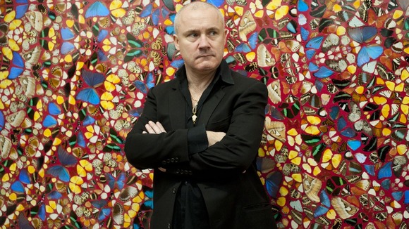 Artist Damien Hirst in front of his work ictured in front of his work I Am Become Death, Shatterer of Worlds