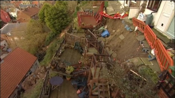 The gardens of these houses collapsed amidst the extreme weather