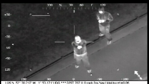 CCTV suspect aiming gun