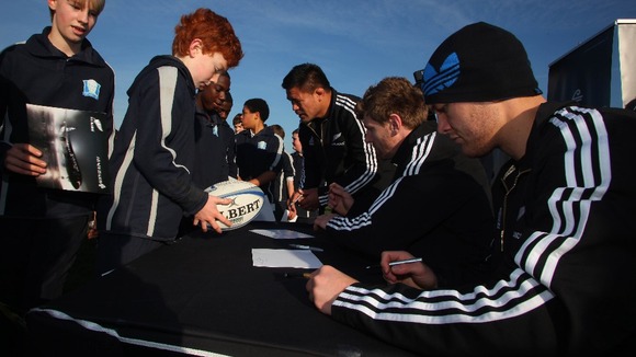 The All Black sign autographs