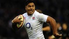England's Manu Tuilagi on his way to scoring a try.