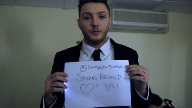 The X Factor sign from James Arthur.