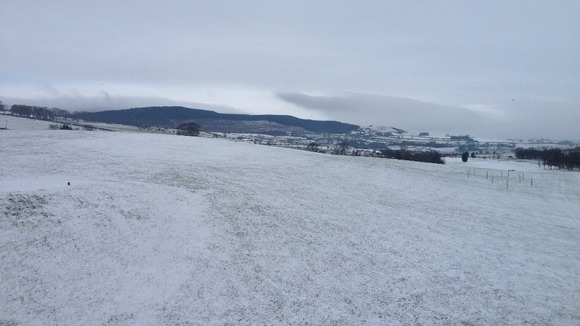 Across Rothbury Golf Course with Simonside Hills in the background