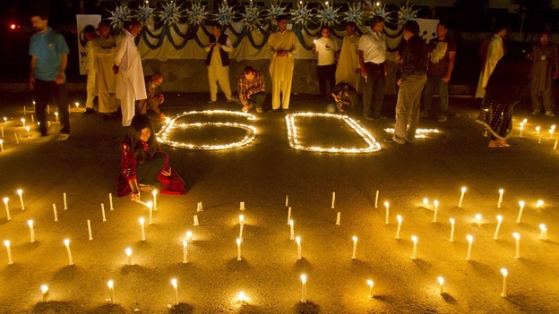 Participants in Islamabad, Pakistan take part inn Earth Hour