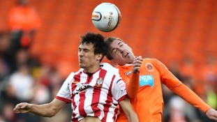 Jack Cork and Martinez Angel heading ball