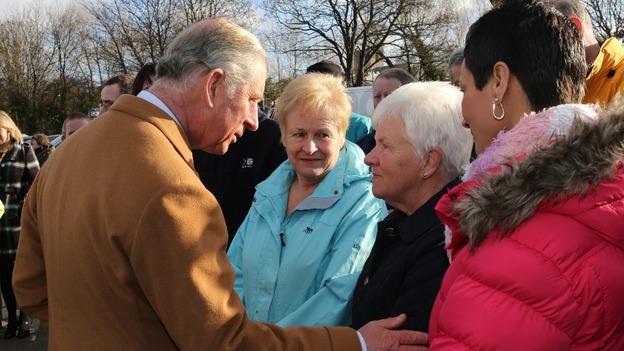 The Prince of Wales talks with flood victim Jenny Jones