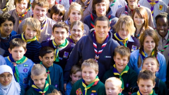 Adventurer and Chief Scout Bear Grylls with young Scouts