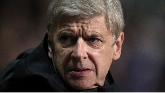 Arsenal boss Arsene Wenger looks worried by form