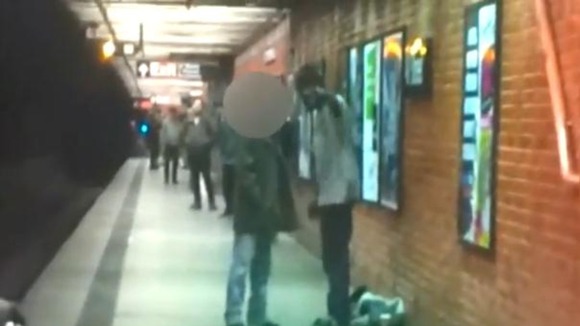 The argument between the two men at a New York City subway station