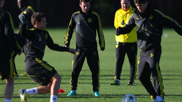 Chelsea's in-form midfielder Juan Mata watches on in Tuesday training