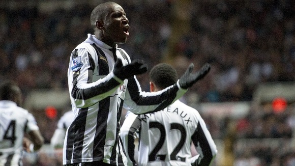 Demba Ba celebrates scoring in Newcastle's 3-0 win over Wigan